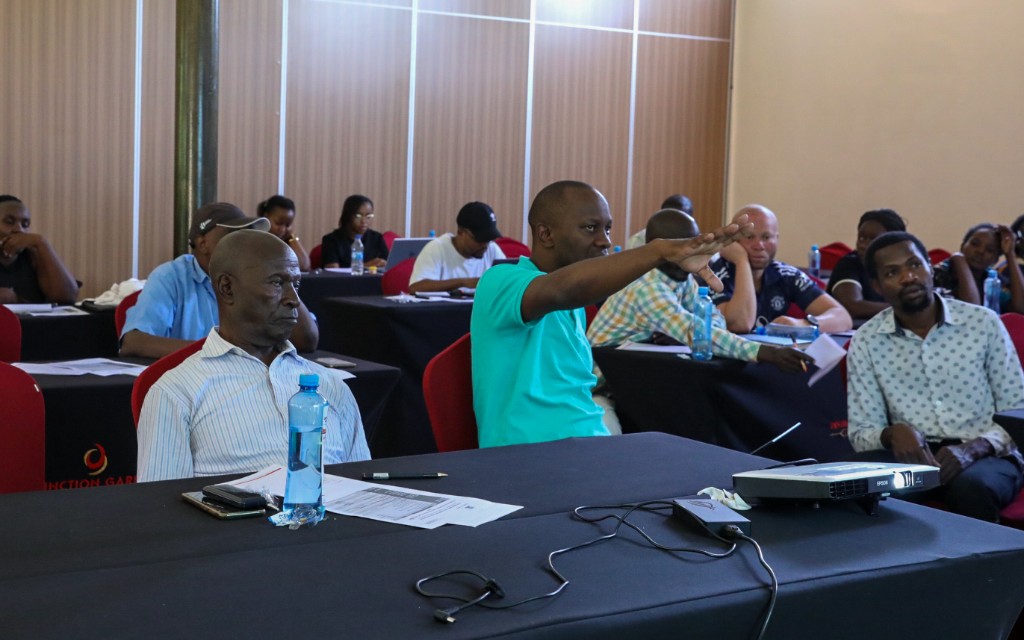 Community members in a participatory discussion during a KISRP workshop